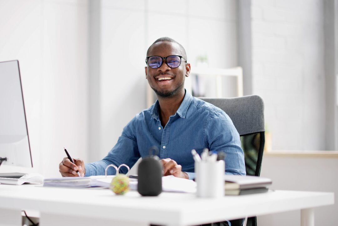 Business consultants discussing B-BBEE strategy in a modern office