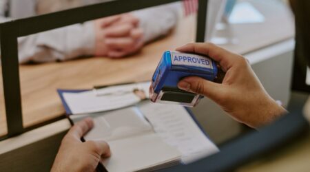 Professional advisor reviewing transformation scorecard documents