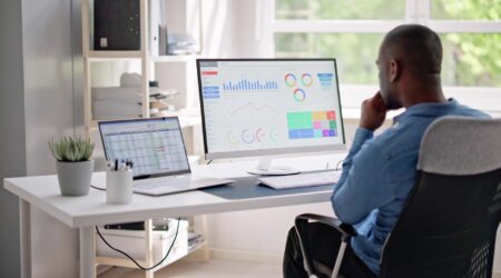 Professional advisor reviewing transformation scorecard documents